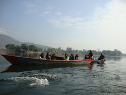 Tourists enjoying their boat rides in Phewa Taal. The boats also take them to the Taal Barahi temple situated on the small island in Phewa Taal.