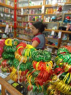 Colorful bangles on display at a cosmetic shop, especially for the month of Shrawan.