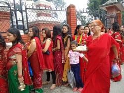 Girls waiting for their turns to worship Lord Shiva. Not only women but also unmarried girls keep fast on Mondays during the month of Shrawan.
